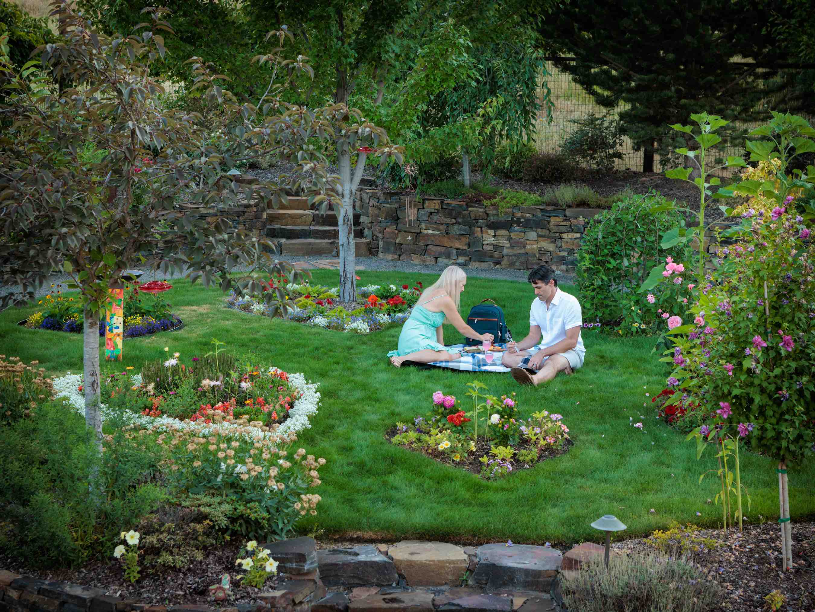 A young couple has a picnic at Country Willows Inn in Ashland, Oregon.