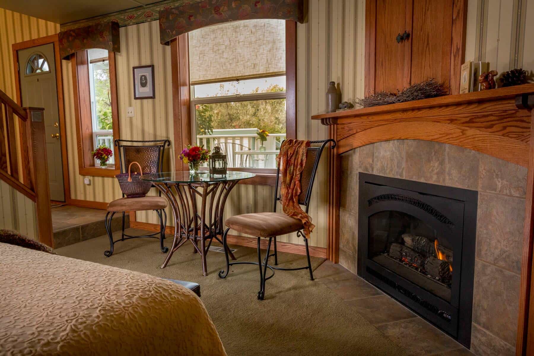 The Hayloft Suite at Country Willows Inn & Estate in Ashland, Oregon has a fireplace in the bedroom and a charming living area on the second floor.
