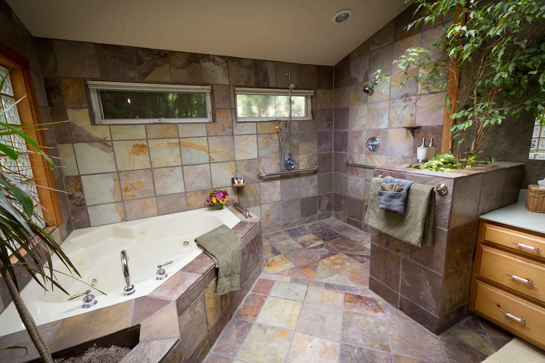  The Pine Ridge Suite at Country Willows Inn & Estate in Ashland, Oregon has a large two-person walk in shower and jacuzzi hot tub. 