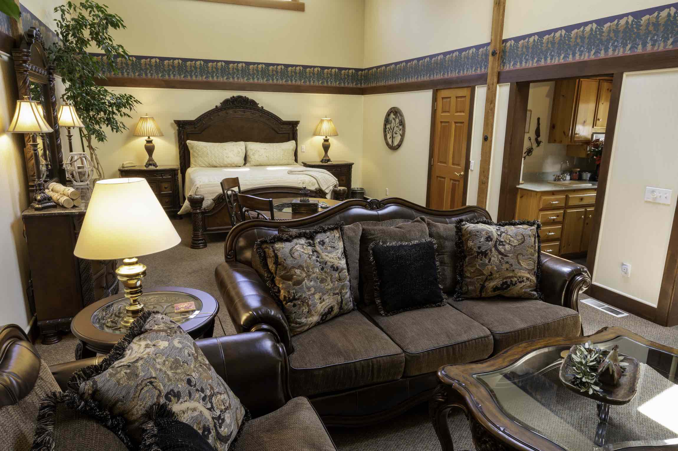 A fireplace warms the living room of the Pine Ridge Suite at Country Willows Inn & Estate in Ashland, Oregon. The Pine Ridge Suite has a jacuzzi hot tub.